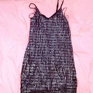 Black and gold sequin dress